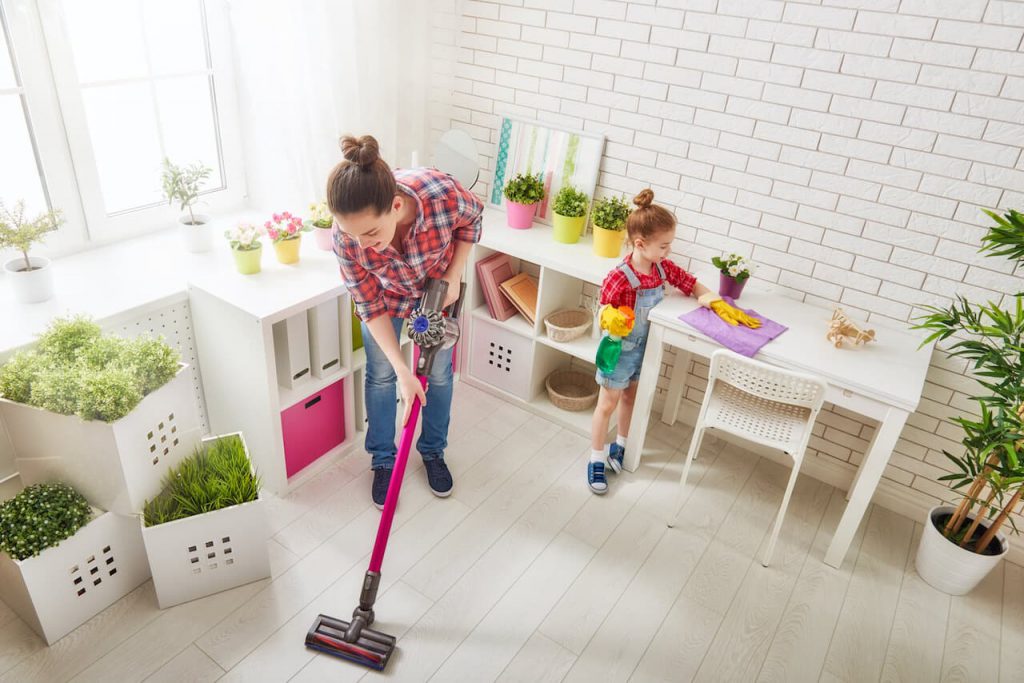 family cleaning the house