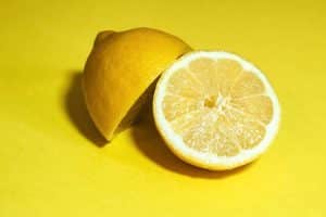 Big, juicy lemon on a yellow background